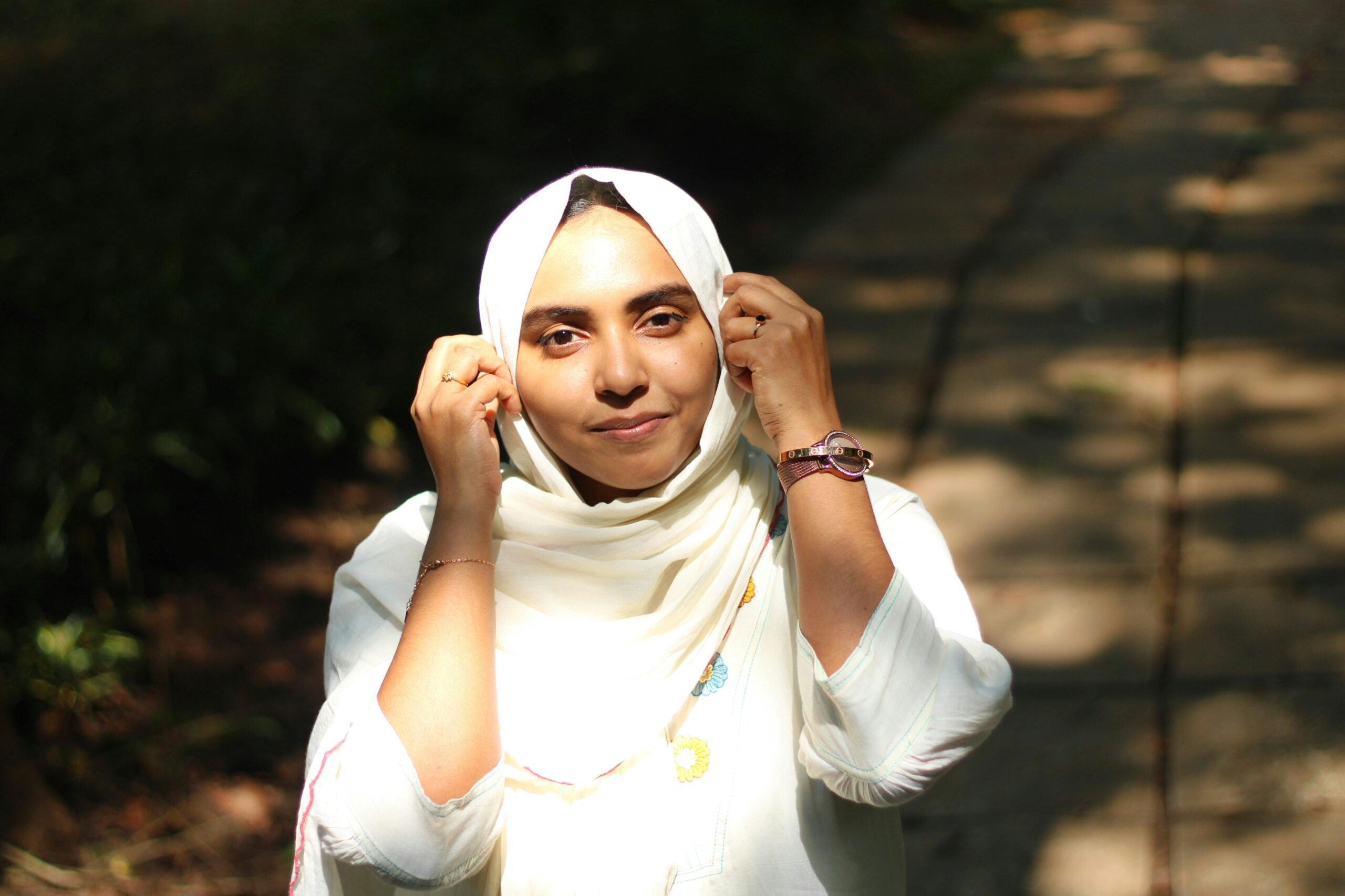 Captivating portrait of a woman in Nilambur, India, embracing nature's tranquility.